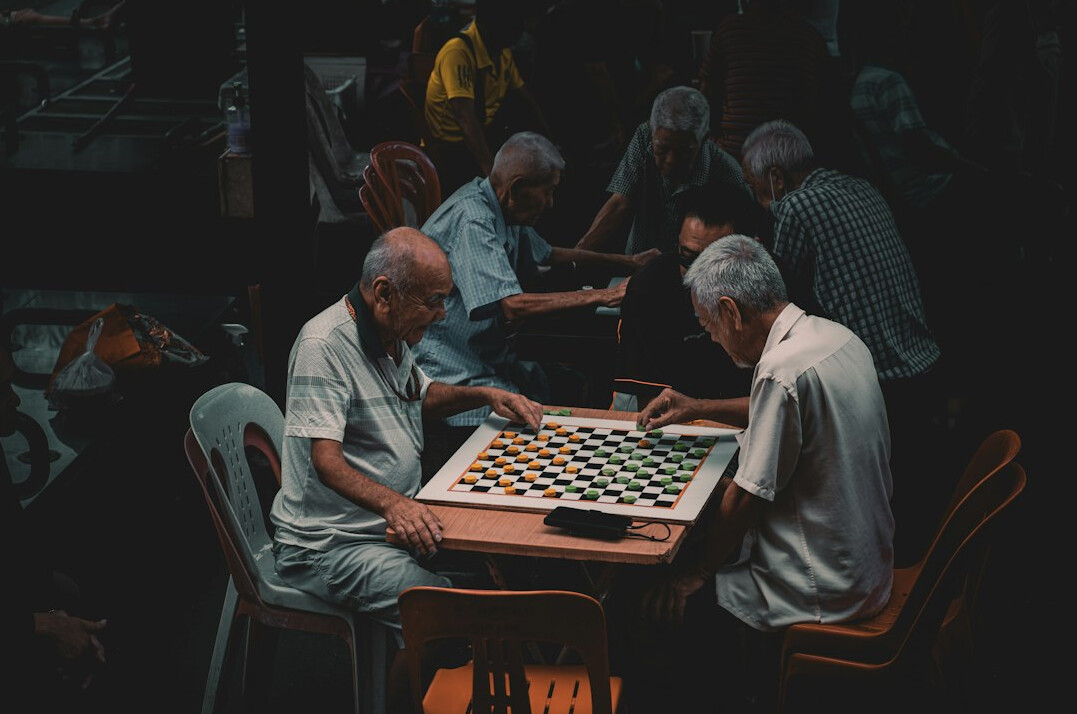 seniors playing board games